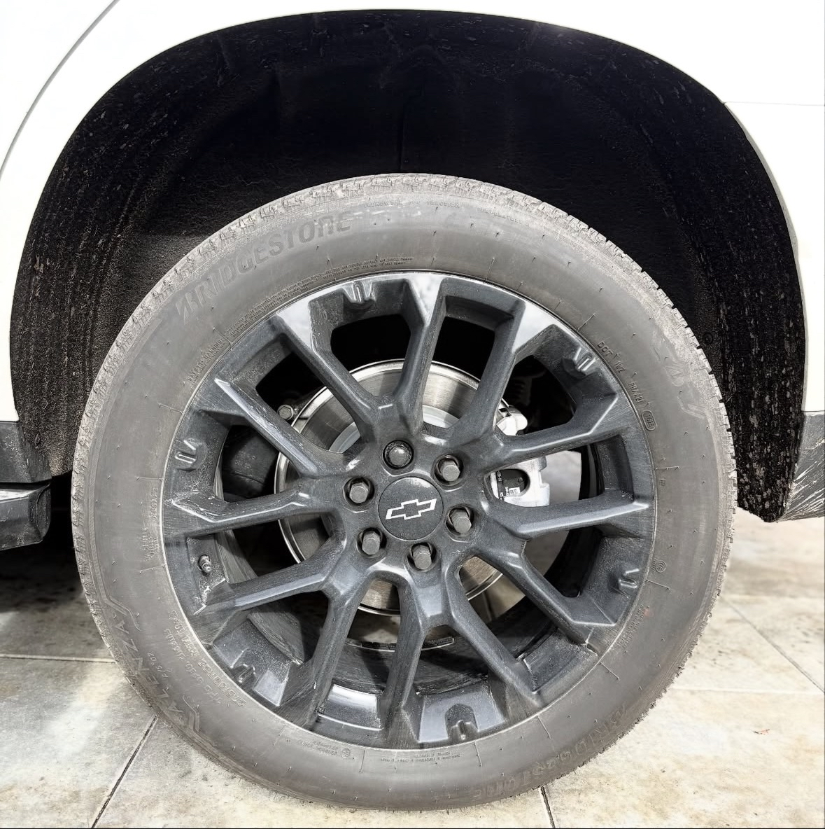 Before wheel cleaning on Chevrolet Tahoe